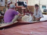 fixing-the-mainsail-at-snug-harbour-sails