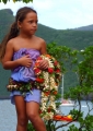 Marquesan girl with flowers