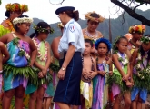 Marquesan children and French police officer